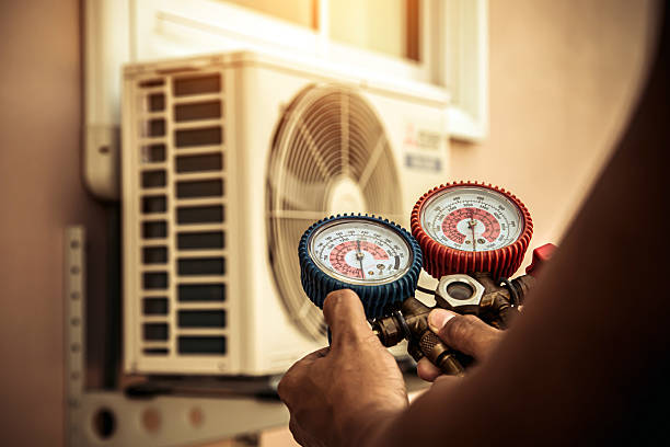 Professional Heat Pump Repair technician working in Stoughton, WI